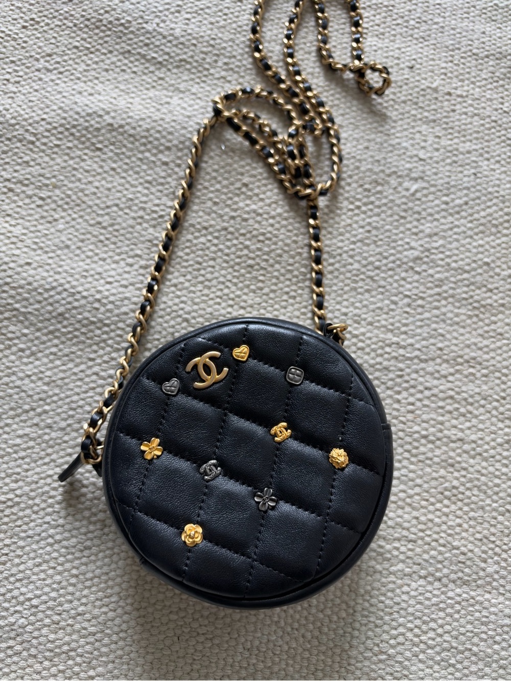 Chanel black leather mini bag with charms